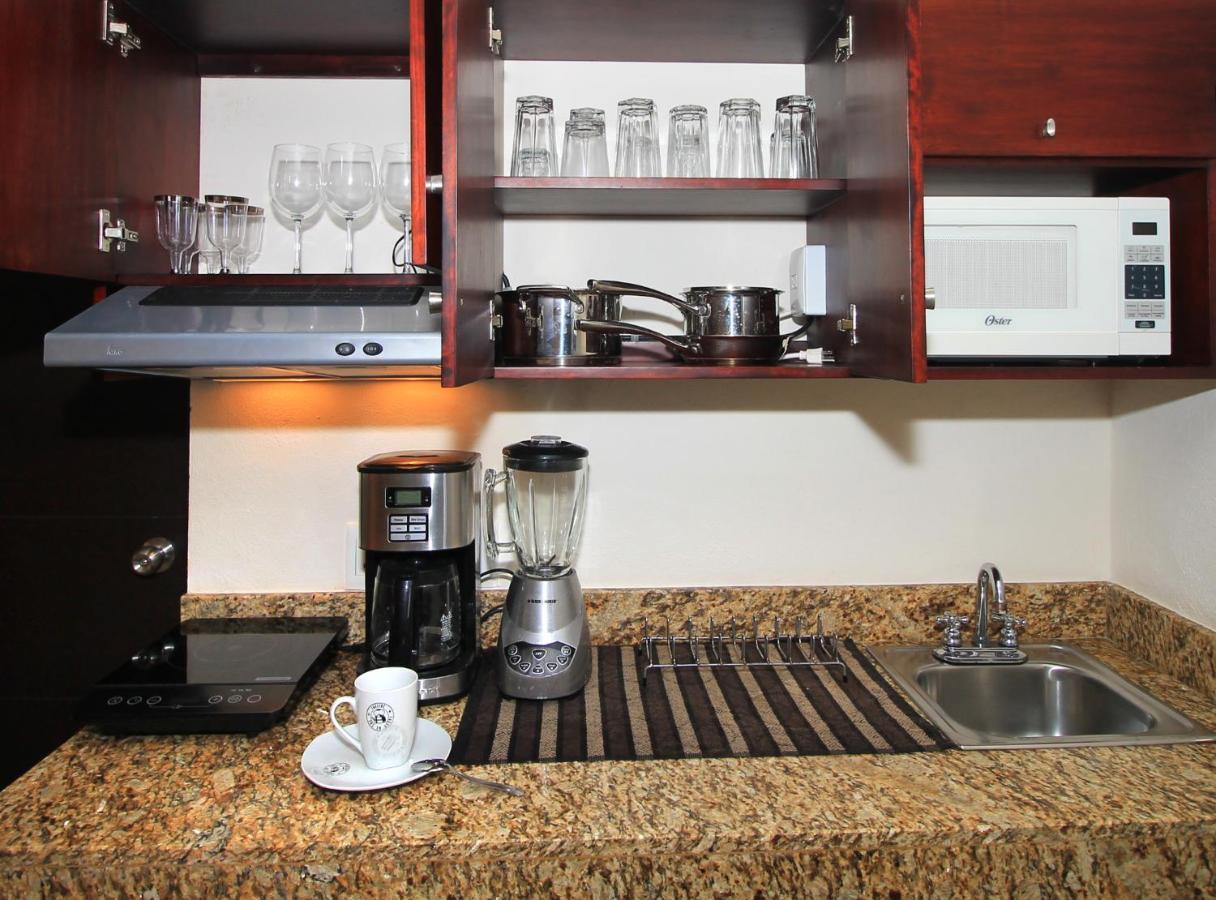 Papagayo Hotel Boutique Playa del Carmen Buitenkant foto A kitchen with granite countertops