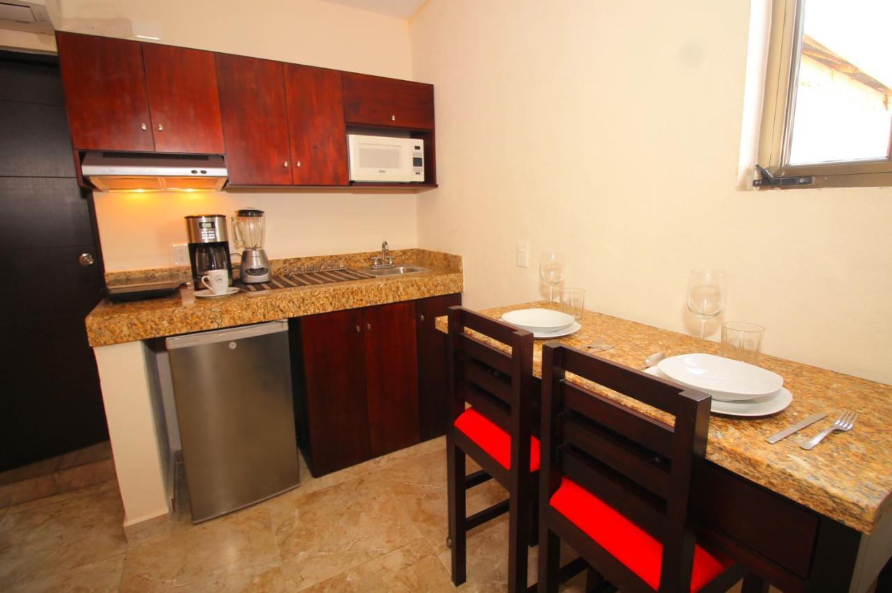 Papagayo Hotel Boutique Playa del Carmen Buitenkant foto A small kitchen