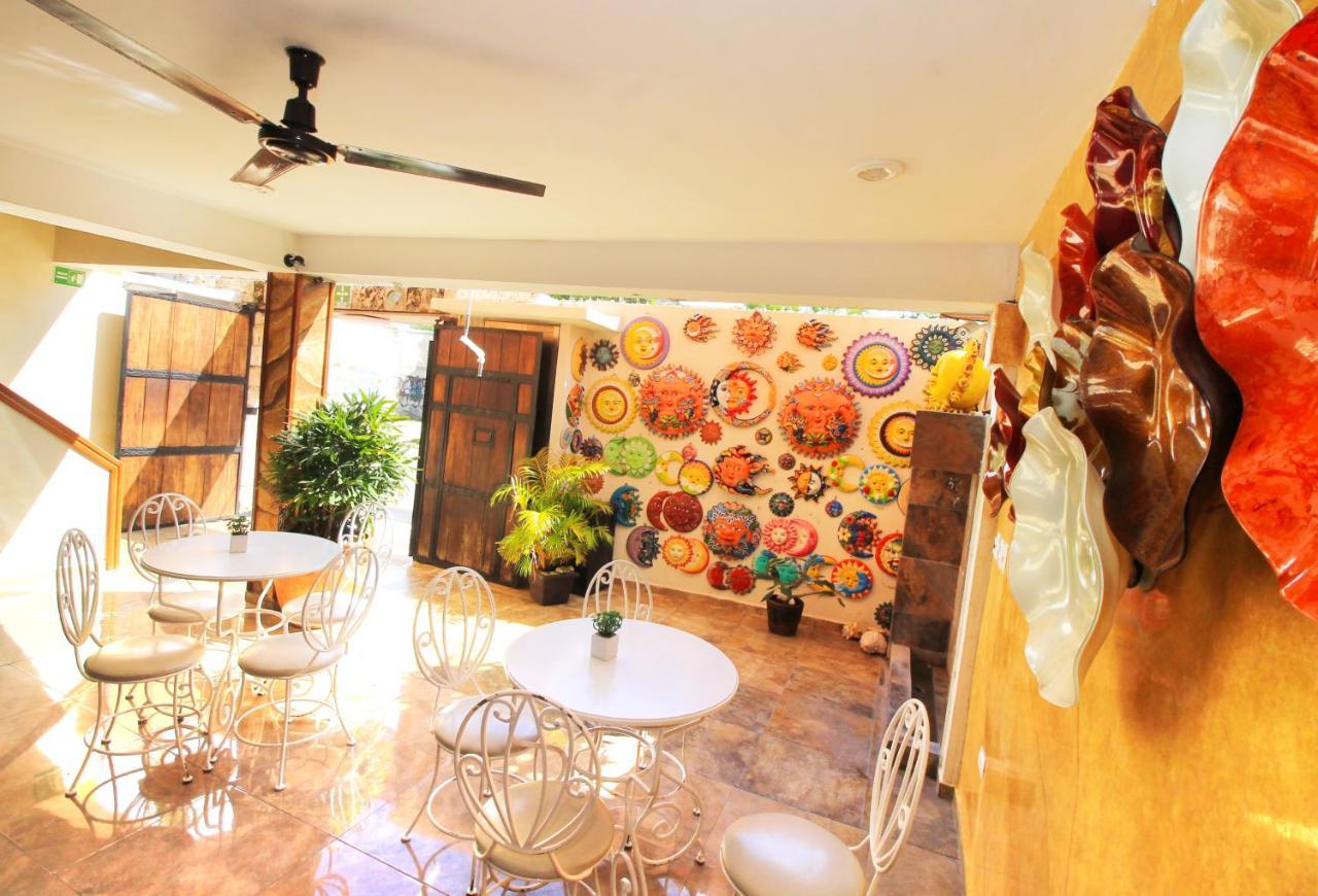 Papagayo Hotel Boutique Playa del Carmen Buitenkant foto The interior of the gallery