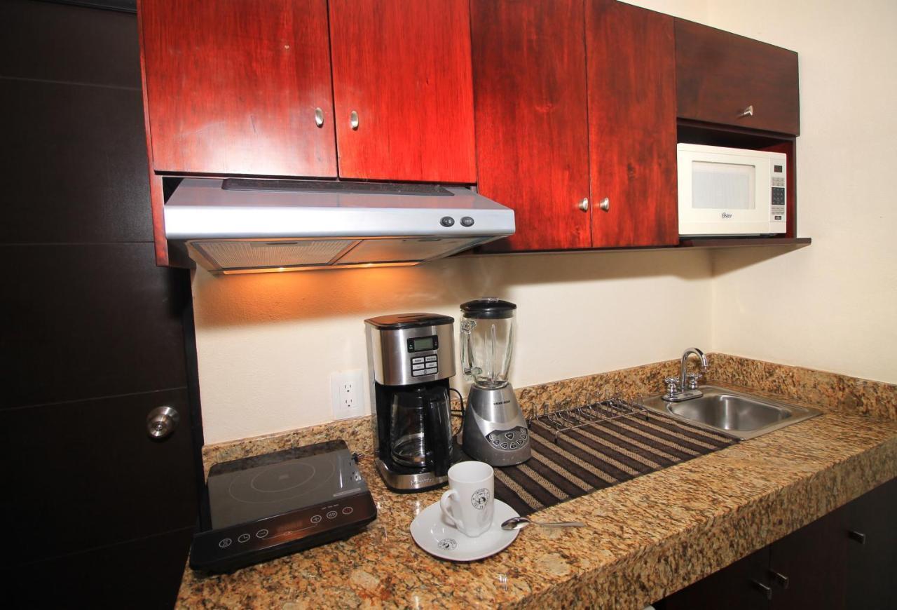 Papagayo Hotel Boutique Playa del Carmen Buitenkant foto A coffeemaker in a kitchen